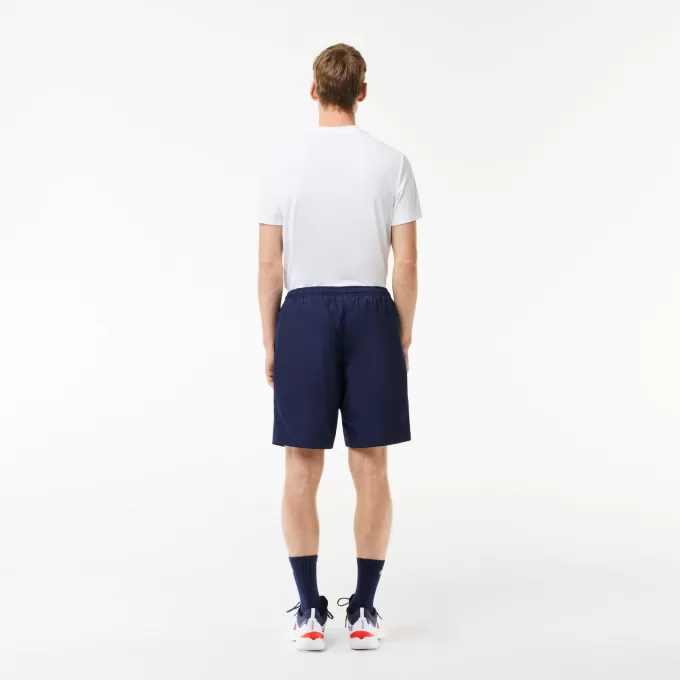 Men’s Lacoste SPORT tennis shorts in solid diamond weave taffeta